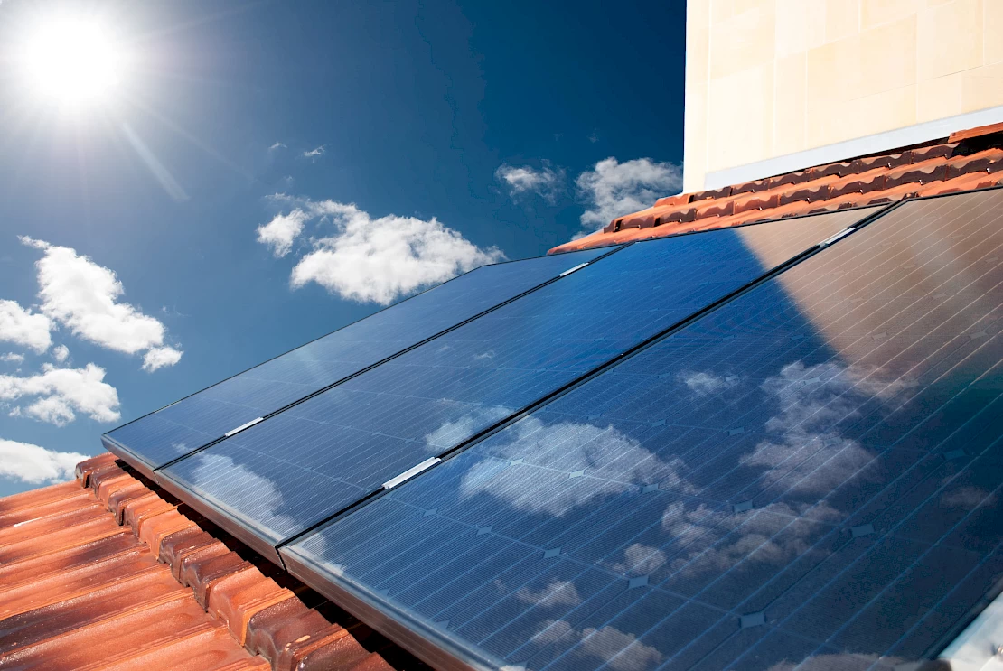 Residental solar panels on Dublin house roof with tiles